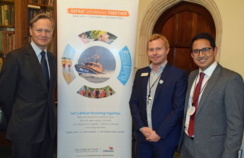 Matthew Offord MP with volunteers and staff of the Lifeboat Fund in Parliament
