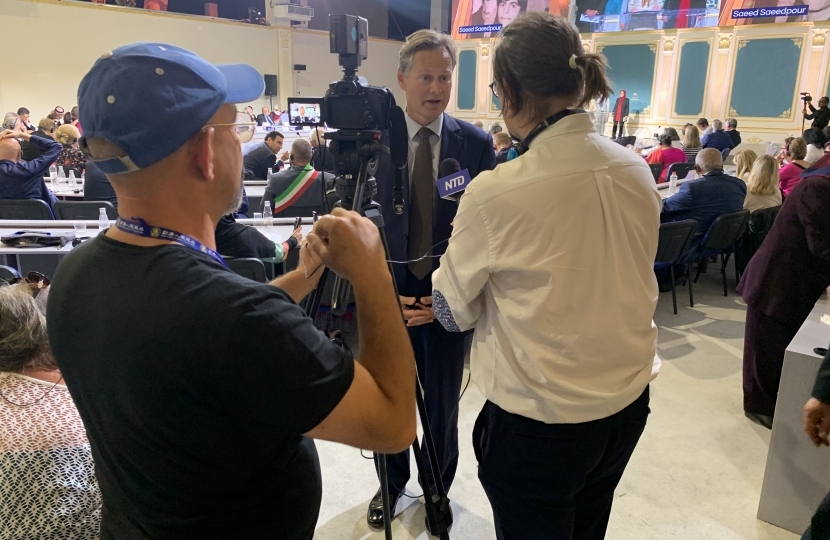 Matthew Offord MP being interviewed in Albania